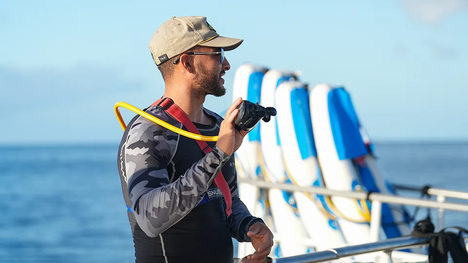Pride of Maui Crewmember Instructing Guests