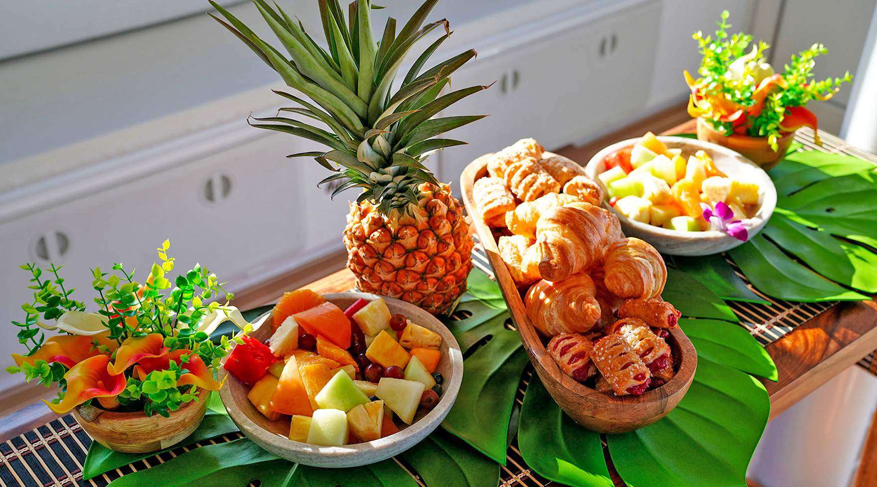 Breakfast spread on ‘Elua: fresh fruit and pastries before departure